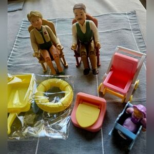 Fisher-Price Pink and Yellow Doll Care Playset with Figures